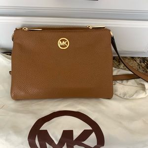 Michael kors cross body purse .
